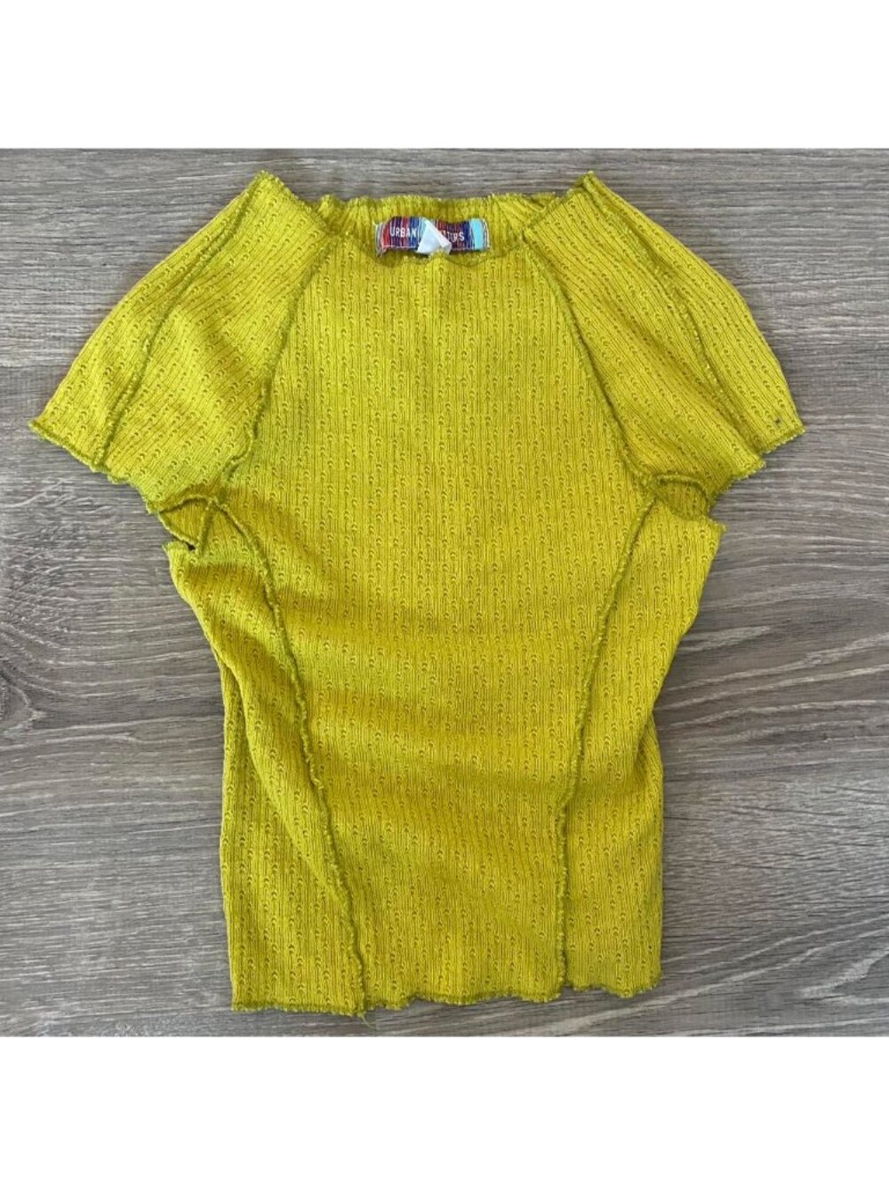 Green ribbed cropped top.